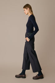 Pantaloni in lana con fiocchi in seta