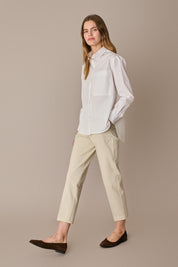 Pantaloni con piega in cotone elasticizzato