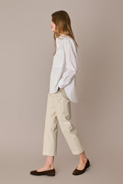 Pantaloni con piega in cotone elasticizzato