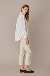 Pantaloni con piega in cotone elasticizzato