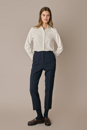 Pantaloni con piega in lana e seta