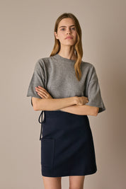 Gonna corta con fiocco blu navy, laccetto da annodare