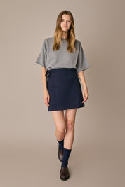 Gonna corta con fiocco blu navy, vestibilità regolare e fiocco