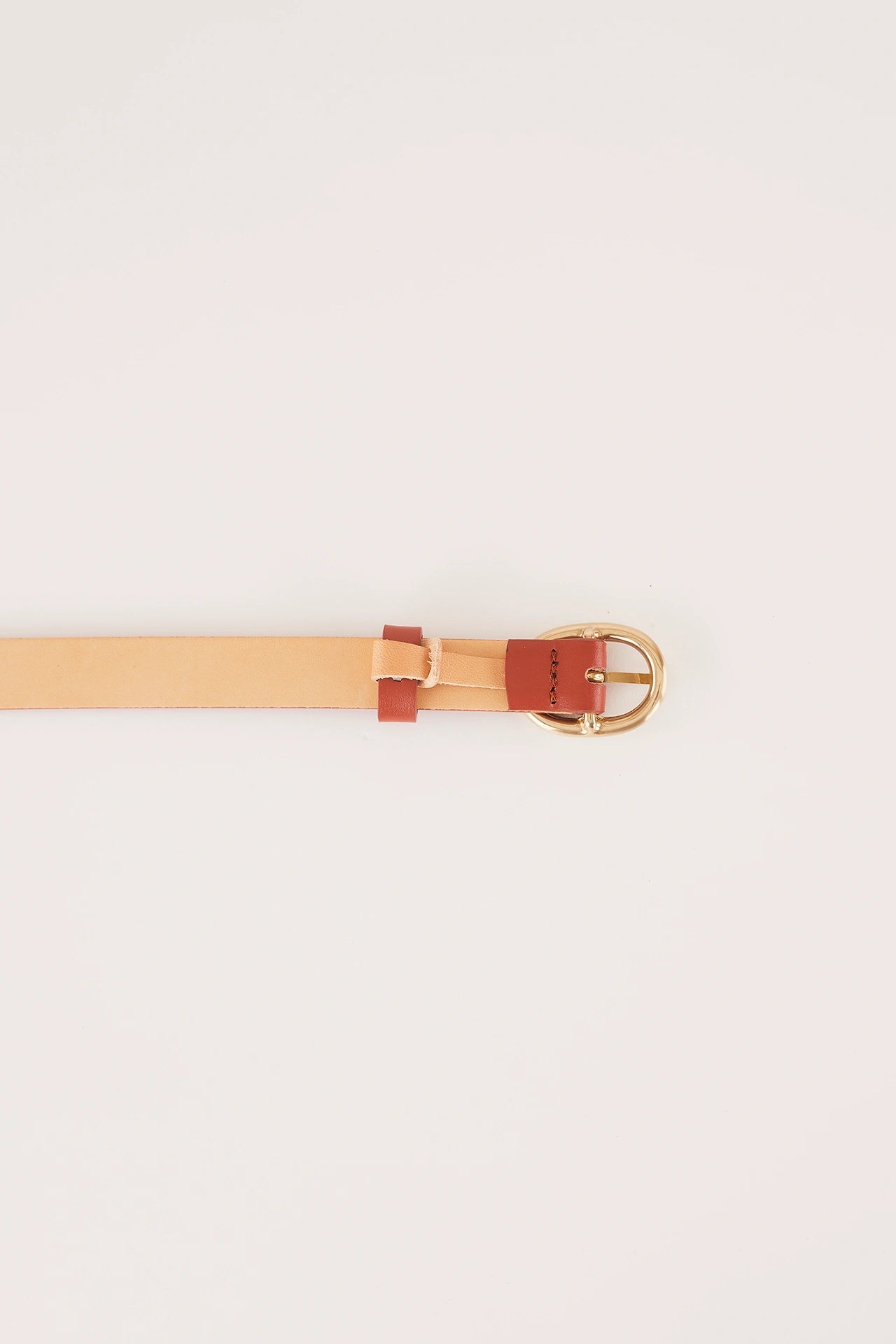 Thin leather belt with gold oval buckle