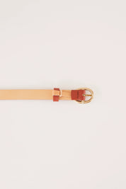 Thin leather belt with gold oval buckle