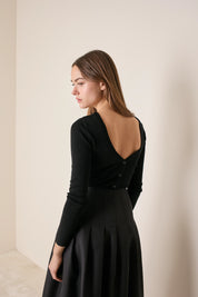 Pullover con scollo a V sulla schiena