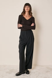 Pullover con scollo a V sulla schiena