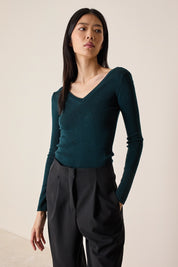 Pullover con scollo a V sulla schiena