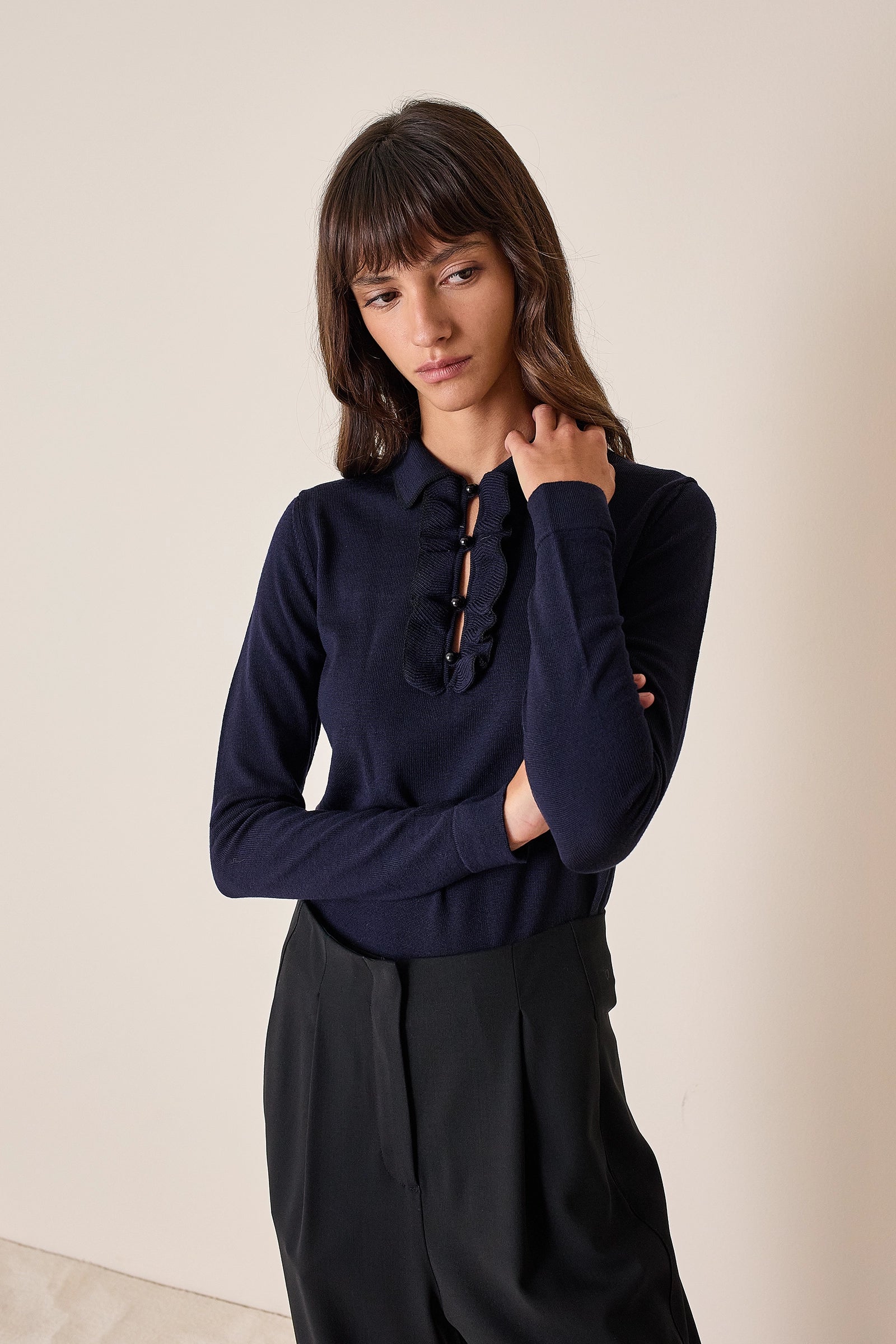 Polo con volant e bottoncini a sfera