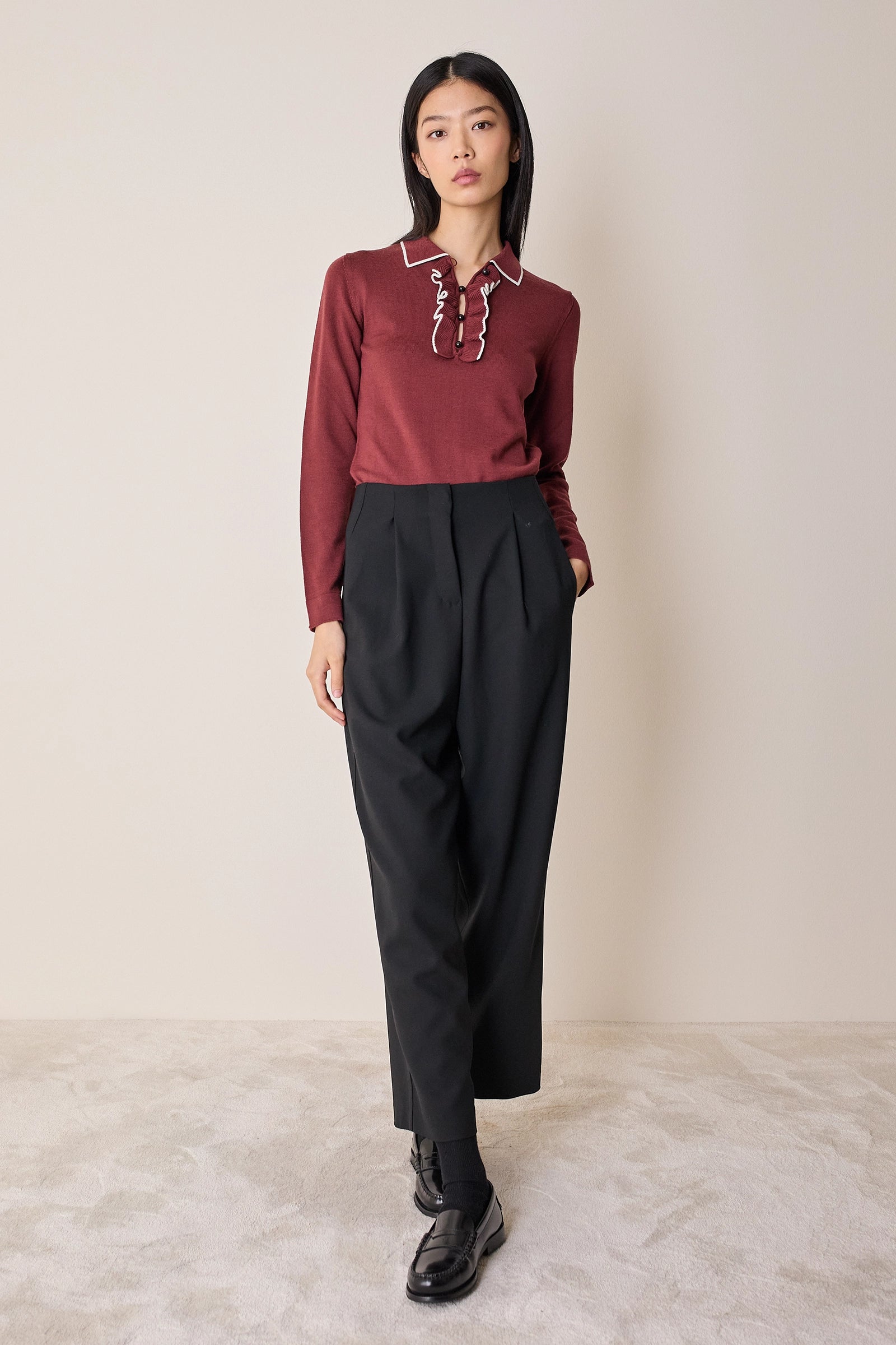 Polo con volant e bottoncini a sfera