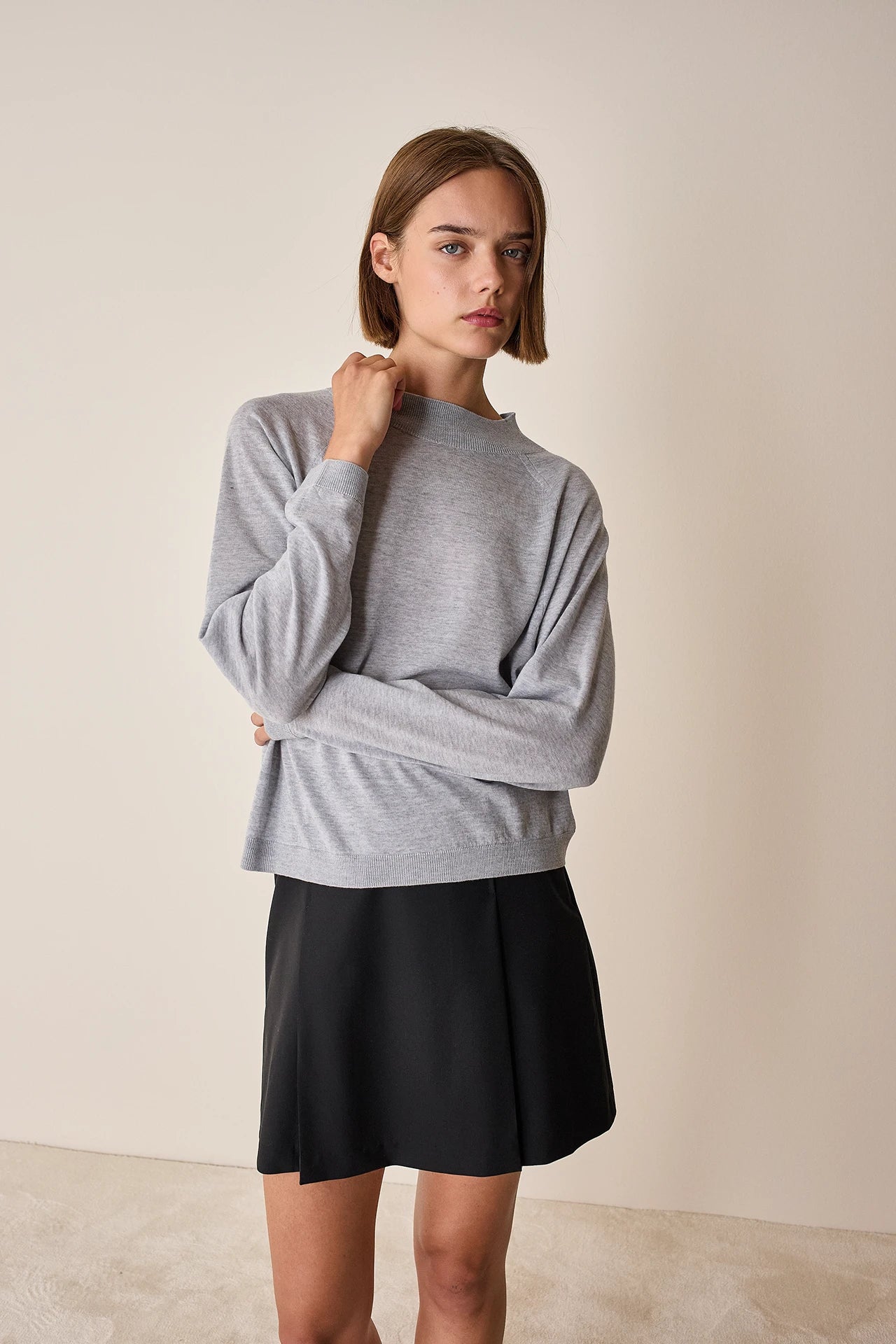 Maglia con collo alto in lana merino
