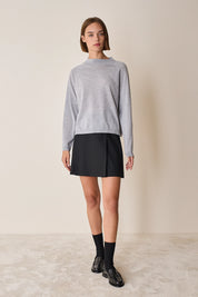 Maglia con collo alto in lana merino