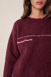 Maglia in alpaca con bordi smerlati