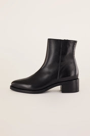 Pointed toe ankle boots with low heel