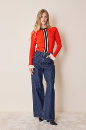 Maglia girocollo con polsini volant