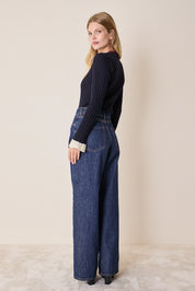 Maglia girocollo con polsini volant