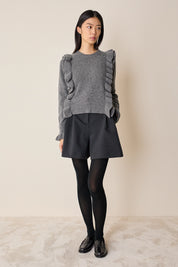 Maglia in lana con volants