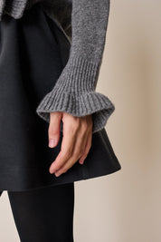 Maglia in lana con volants