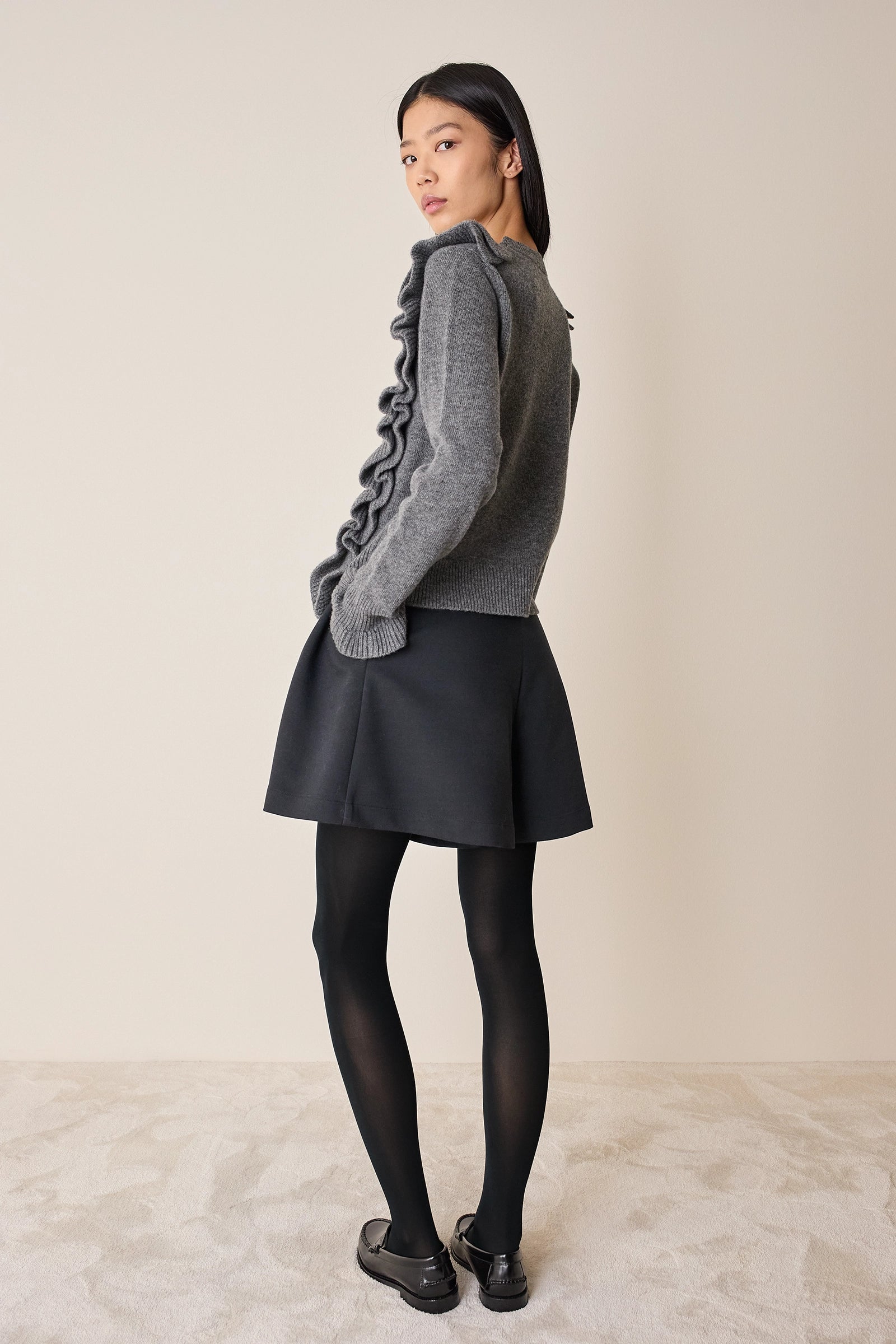 Maglia in lana con volants