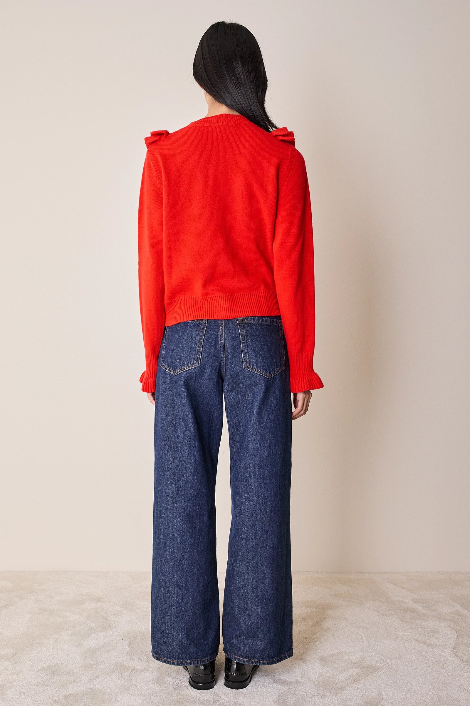 Maglia in lana con volants