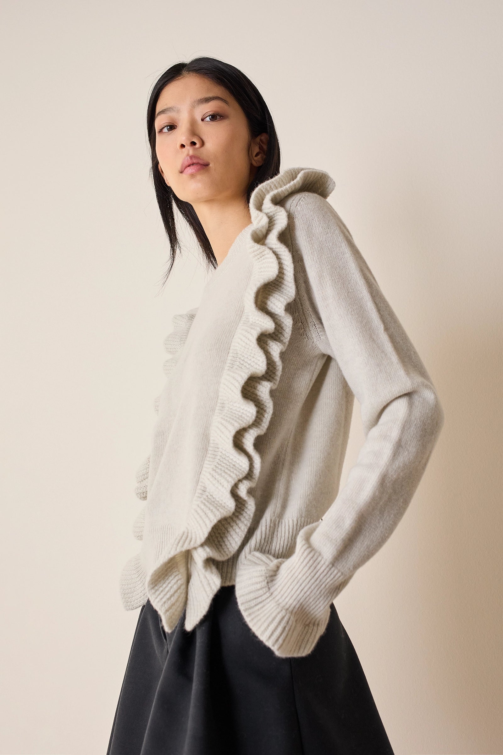 Maglia in lana con volants