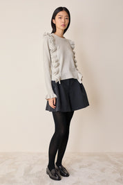 Maglia in lana con volants