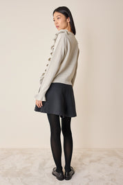 Maglia in lana con volants