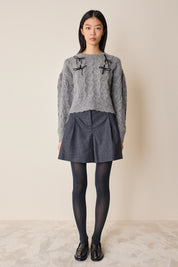 Maglione con fiocchi in velluto