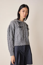 Maglione con fiocchi in velluto