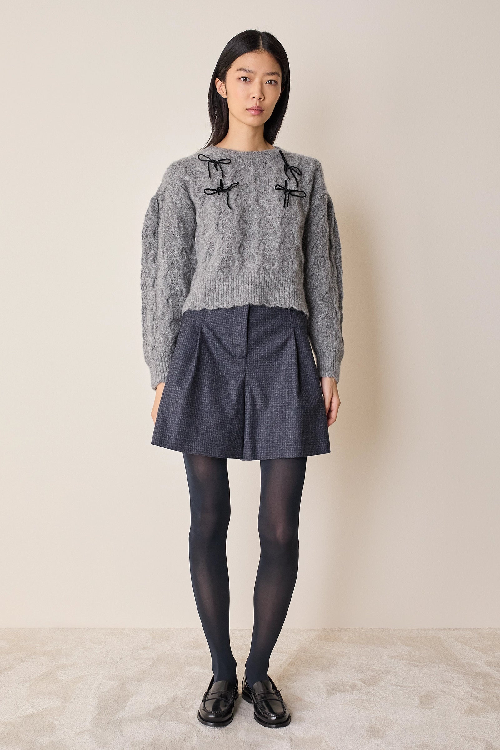 Maglione con fiocchi in velluto