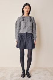 Maglione con fiocchi in velluto