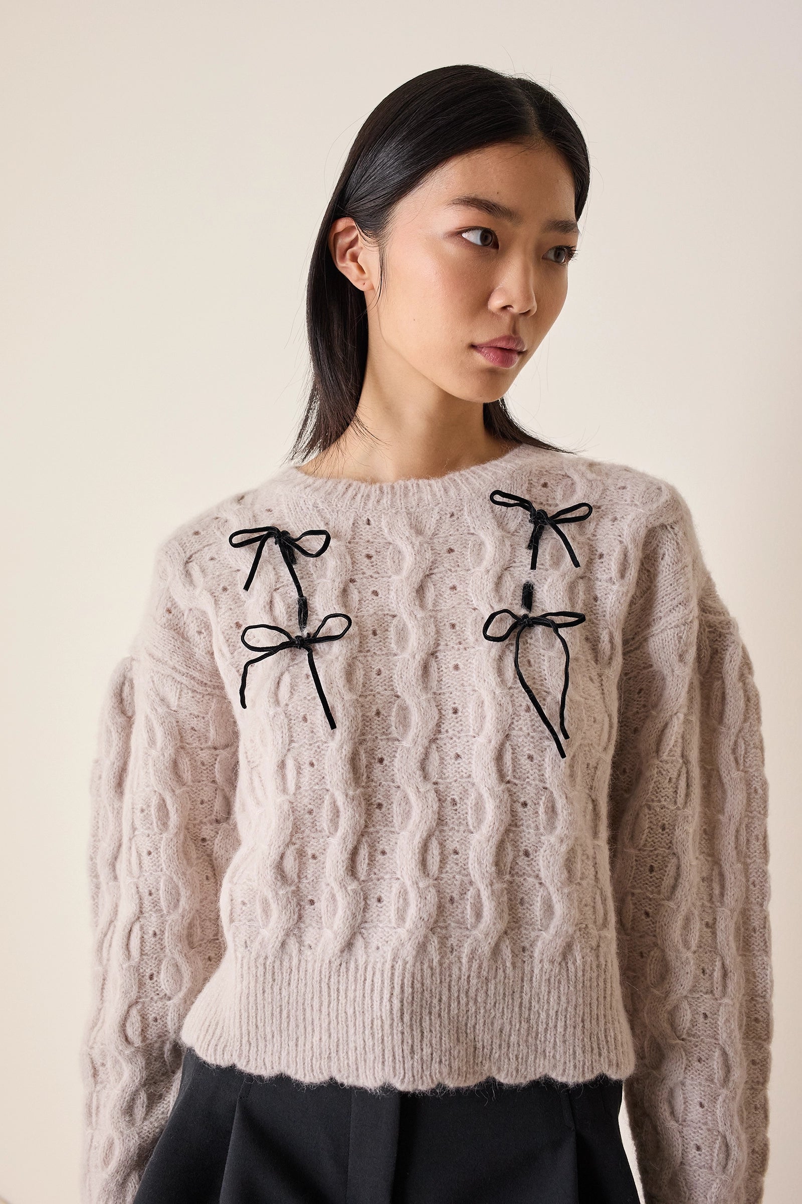 Maglione con fiocchi in velluto