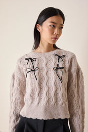 Maglione con fiocchi in velluto