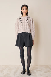 Maglione con fiocchi in velluto