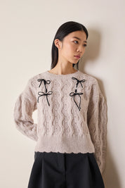 Maglione con fiocchi in velluto