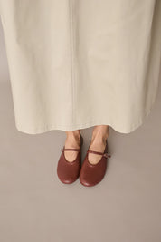 Ballerine in nappa con cinturino