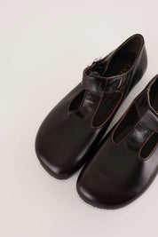 Scarpe T-bar con suola in gomma