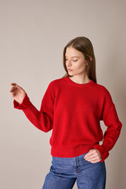 Maglia punto pannocchia con polsini volant