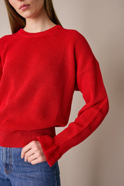 Maglia punto pannocchia con polsini volant