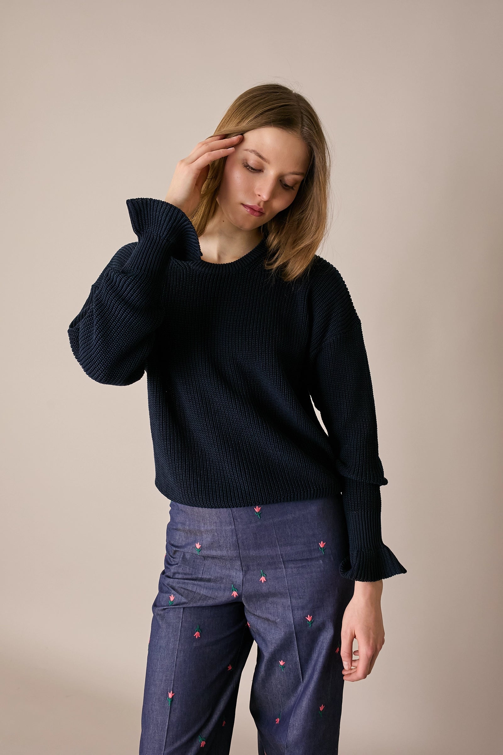 Maglia punto pannocchia con polsini volant