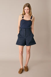 Top in maglia con volant
