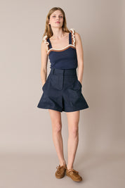 Top in maglia con volant