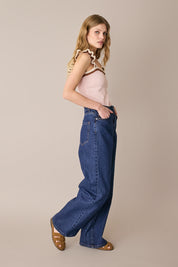 Top in maglia con volant