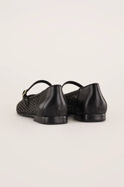 Ballerine in pelle traforata con cinturino