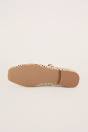 Ballerine in pelle traforata con cinturino