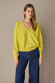 Maglia over con scollo a V giallo, maniche raglan, dal taglio over