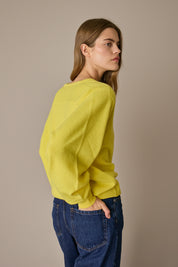Maglia over con scollo a V giallo, con maniche raglan