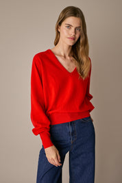 Maglia over con scollo a V rosso, maniche raglan e scollo a V, dal taglio over