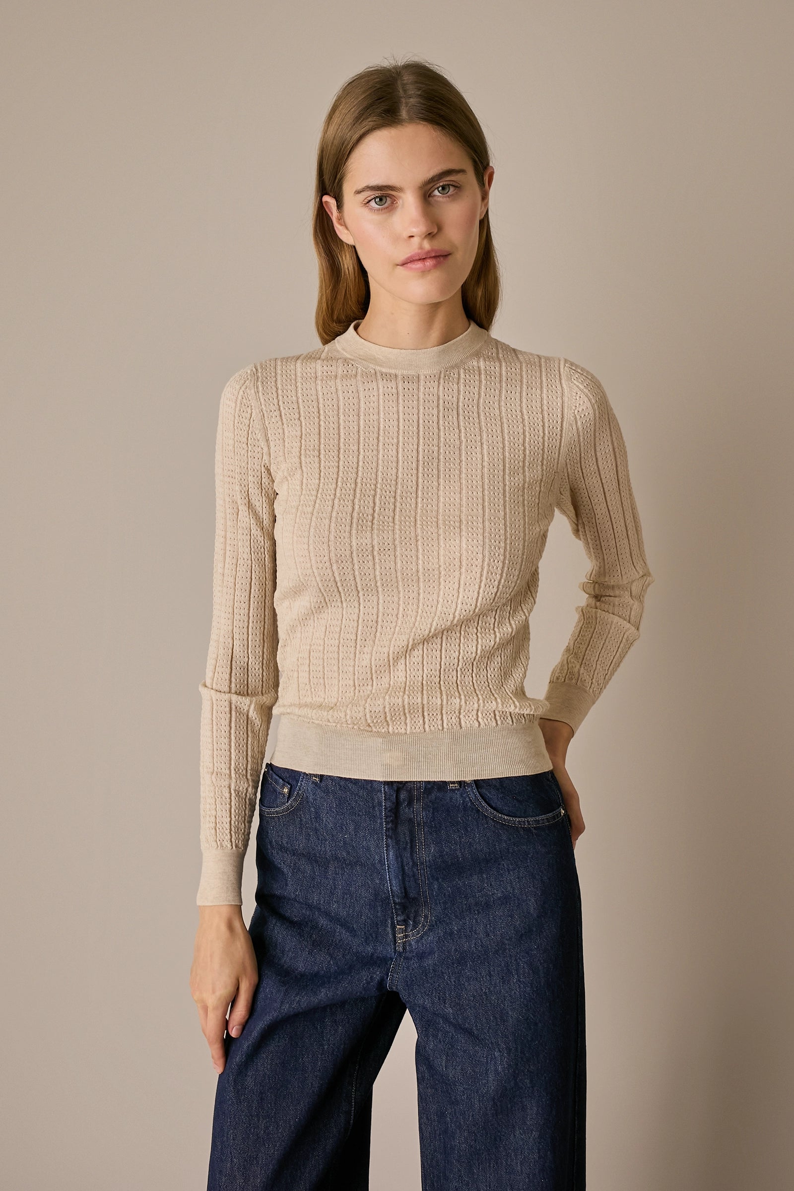 Maglia traforata in lana Merino extrafine